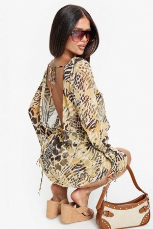 Get Closer Backless Romper Faded Leopard