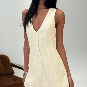 Sylvara Textured Button Up Playsuit Yellow
