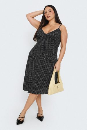 Cabernet Asymmetrical Set Black Polka Curve