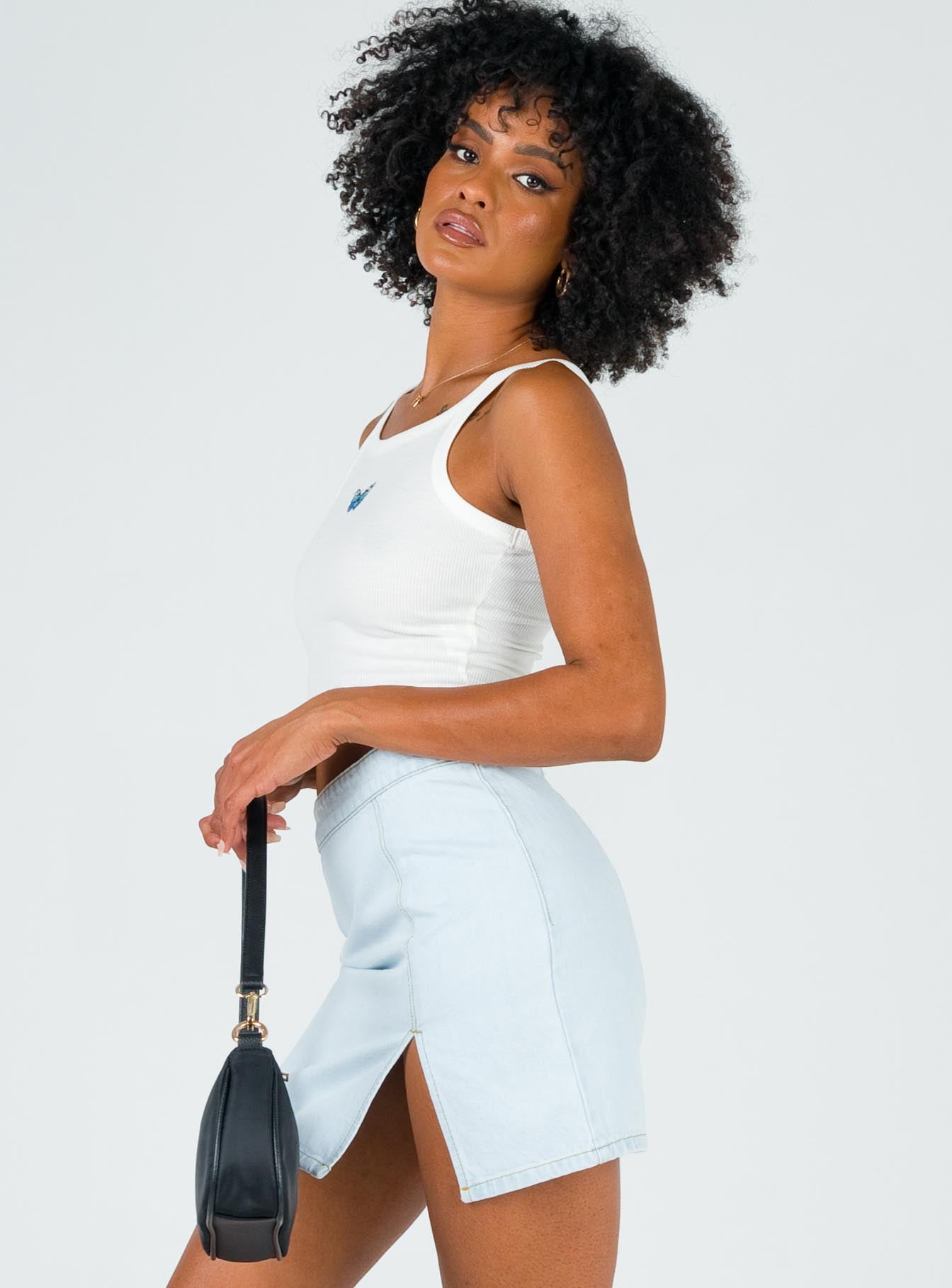 The Lola Mini Skirt Light Wash Denim - Image 3